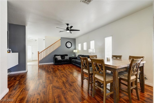 8169 Skytop Ledge Ave, Las Vegas, NV 89178 - dining space featuring stairway, wood finished floors, and ceiling fan
