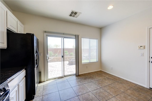 8169 Skytop Ledge Ave, Las Vegas, NV 89178 - unfurnished dining area with healthy amount of natural light, light tile patterned floors, and recessed lighting