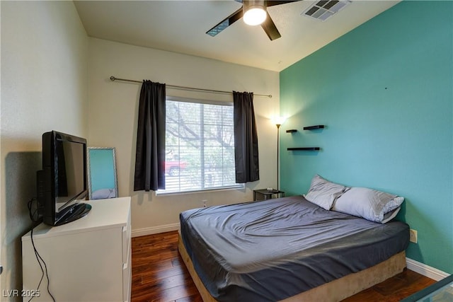 8169 Skytop Ledge Ave, Las Vegas, NV 89178 - bedroom with dark wood-style floors and ceiling fan