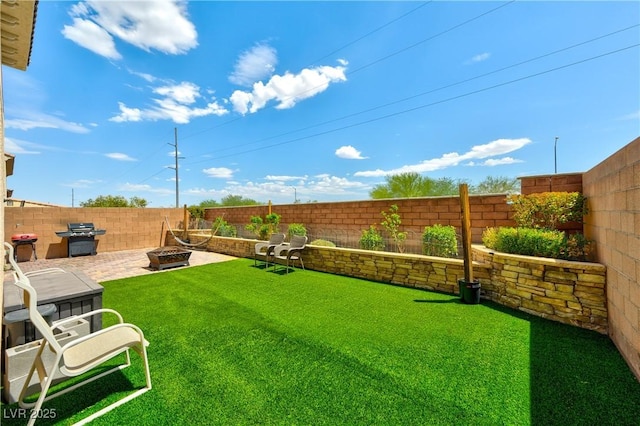 8169 Skytop Ledge Ave, Las Vegas, NV 89178 - fenced backyard with a patio