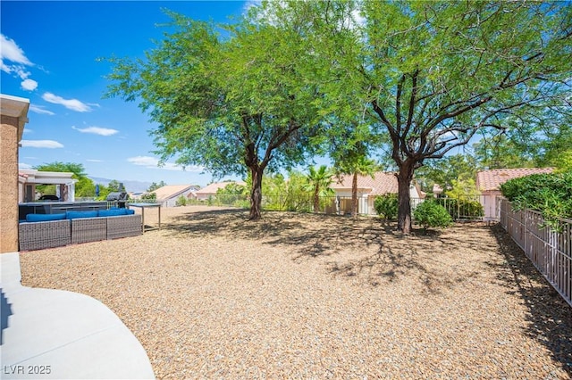 2548 Tumble Brook Dr, Las Vegas, NV 89134 - view of yard featuring an outdoor hangout area