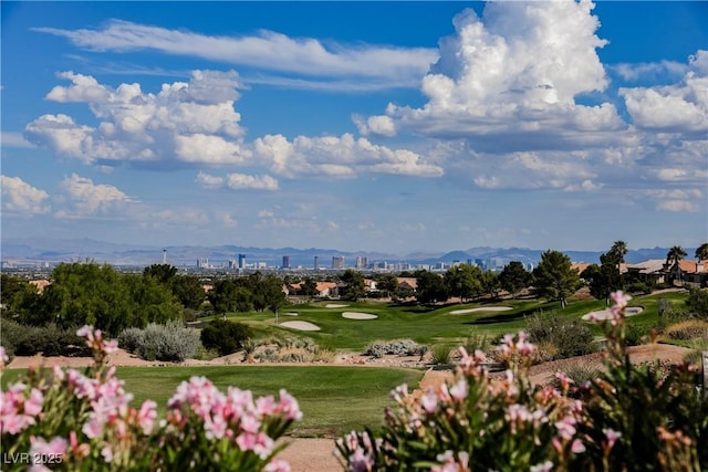 2548 Tumble Brook Dr, Las Vegas, NV 89134 - view of home's community with golf course view, a view of city, a lawn, and a mountain view