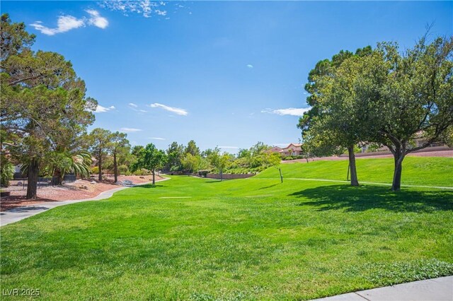 2548 Tumble Brook Dr, Las Vegas, NV 89134 - surrounding community with a lawn