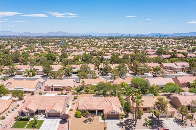 2548 Tumble Brook Dr, Las Vegas, NV 89134 - aerial perspective of suburban area with a mountainous background