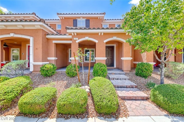 2337 Via Barranca St, Henderson, NV 89044 - mediterranean / spanish-style home featuring stucco siding, a tiled roof, and covered porch