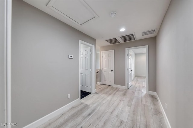 2337 Via Barranca St, Henderson, NV 89044 - corridor with light wood-type flooring and attic access