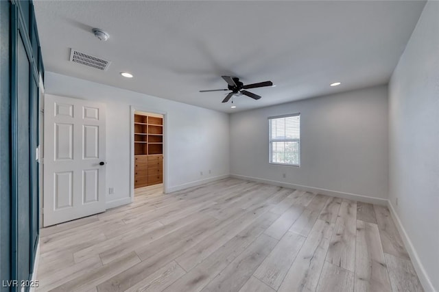 2337 Via Barranca St, Henderson, NV 89044 - unfurnished bedroom featuring light wood finished floors, recessed lighting, a spacious closet, and ceiling fan