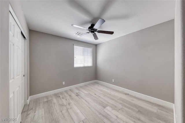2337 Via Barranca St, Henderson, NV 89044 - unfurnished bedroom featuring a closet, light wood-style floors, and ceiling fan