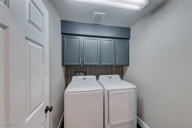 2337 Via Barranca St, Henderson, NV 89044 - washroom featuring cabinet space, separate washer and dryer, and a textured ceiling