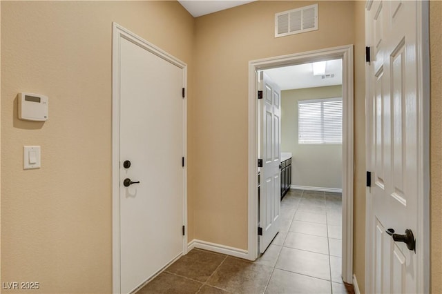 4208 Falcons Flight Ave, North Las Vegas, NV 89084 - corridor with tile patterned floors and baseboards