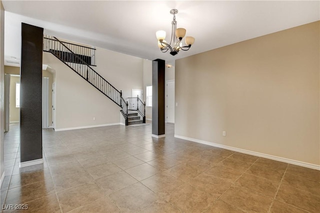 4208 Falcons Flight Ave, North Las Vegas, NV 89084 - unfurnished room with a chandelier, stairs, and light tile patterned flooring