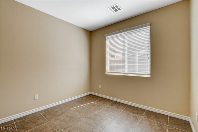 4208 Falcons Flight Ave, North Las Vegas, NV 89084 - spare room with baseboards and tile patterned floors