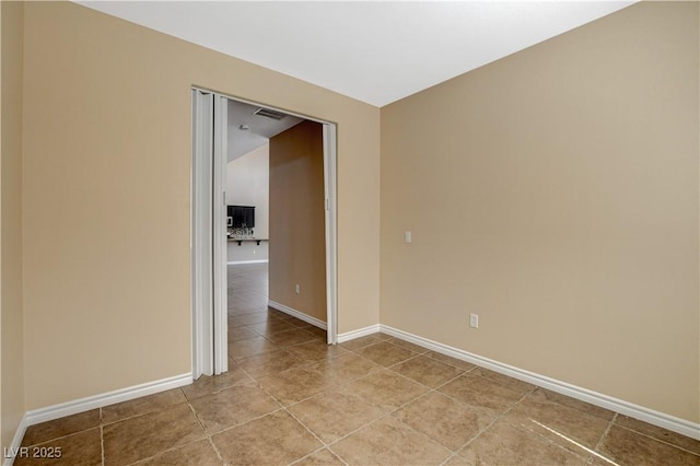 4208 Falcons Flight Ave, North Las Vegas, NV 89084 - unfurnished room featuring tile patterned floors and baseboards