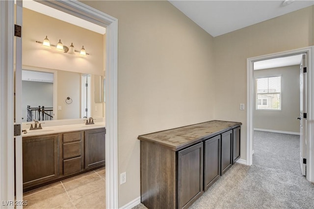 4208 Falcons Flight Ave, North Las Vegas, NV 89084 - full bathroom with double vanity and baseboards