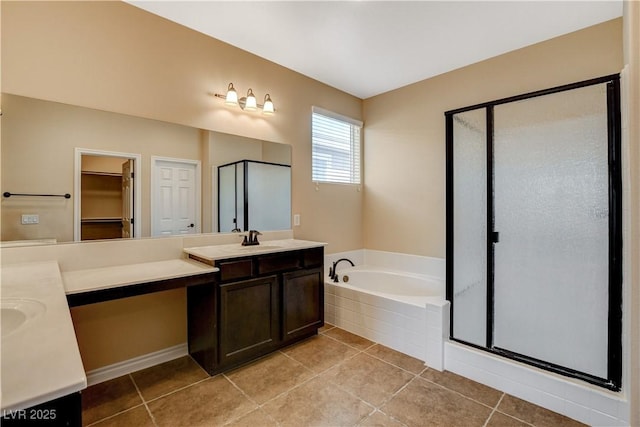 4208 Falcons Flight Ave, North Las Vegas, NV 89084 - bathroom featuring vanity, a shower stall, a bath, and tile patterned flooring