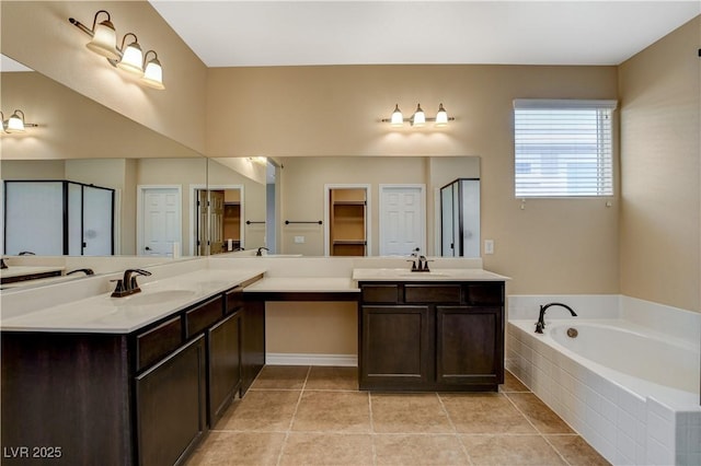4208 Falcons Flight Ave, North Las Vegas, NV 89084 - full bath featuring vanity, a garden tub, a stall shower, and tile patterned floors