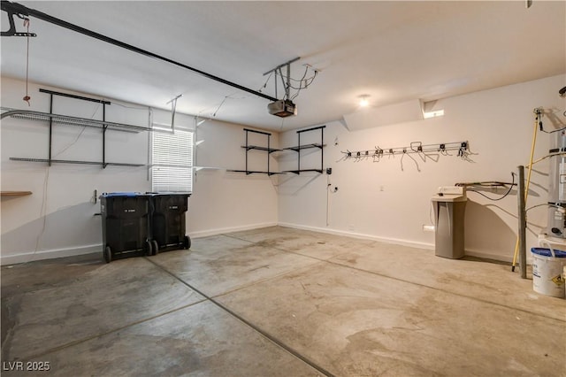 4208 Falcons Flight Ave, North Las Vegas, NV 89084 - garage featuring baseboards and a garage door opener