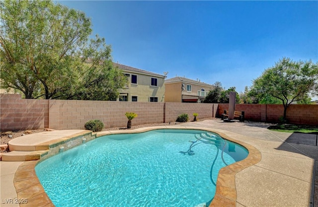 4208 Falcons Flight Ave, North Las Vegas, NV 89084 - view of pool featuring a patio area and a fenced backyard