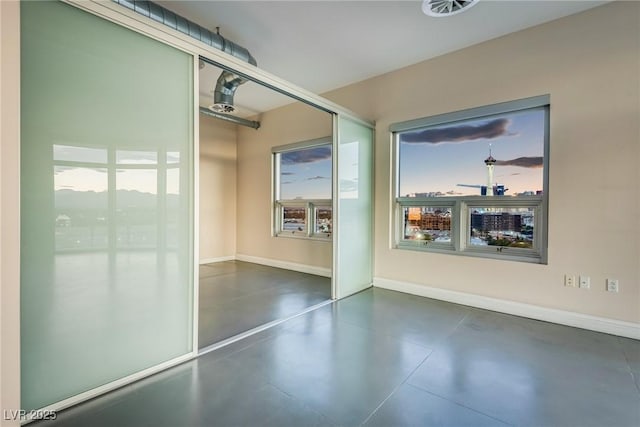200 Hoover Ave Unit 903, Las Vegas, NV 89101 - spare room with concrete floors and healthy amount of natural light