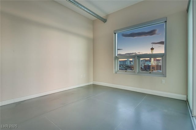 200 Hoover Ave Unit 903, Las Vegas, NV 89101 - empty room featuring finished concrete floors and baseboards