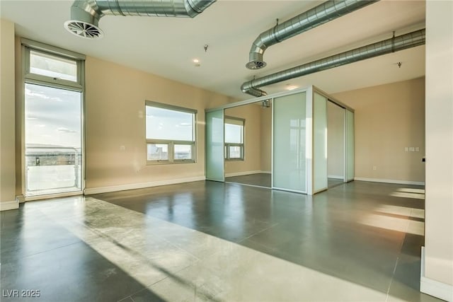 200 Hoover Ave Unit 903, Las Vegas, NV 89101 - garage featuring baseboards