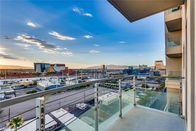 200 Hoover Ave Unit 903, Las Vegas, NV 89101 - balcony at dusk featuring a city view