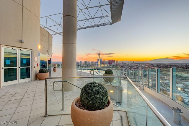 200 Hoover Ave Unit 903, Las Vegas, NV 89101 - balcony at dusk featuring a view of city