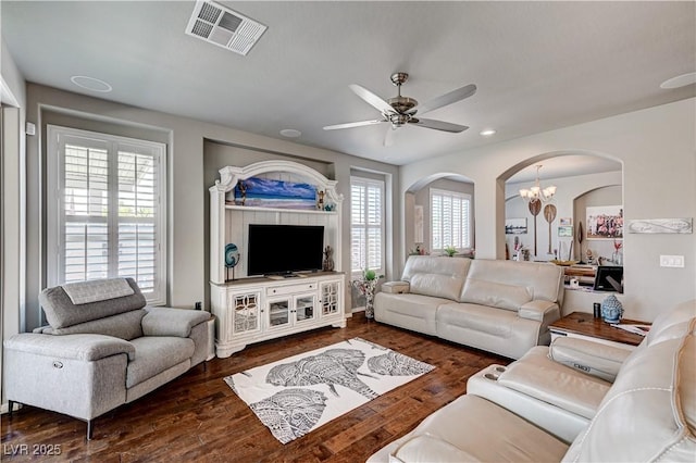 3605 Greenbriar Bluff Ave, North Las Vegas, NV 89081 - living area with arched walkways, a ceiling fan, a chandelier, wood finished floors, and recessed lighting