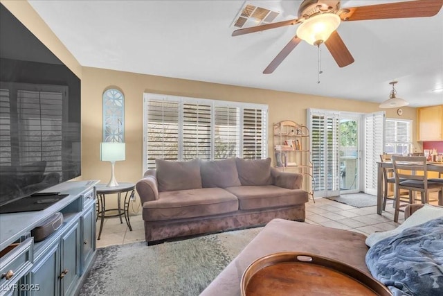 9836 La Vid Ct, Las Vegas, NV 89117 - living room with light tile patterned floors and ceiling fan