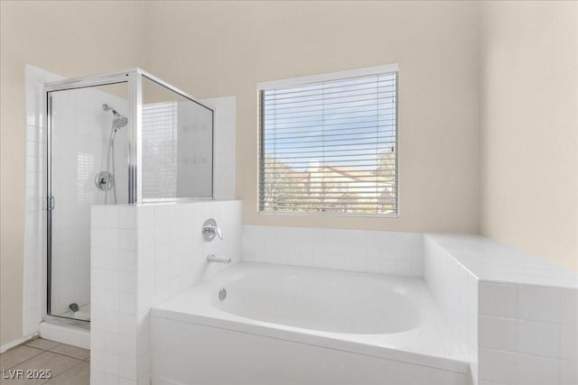 9836 La Vid Ct, Las Vegas, NV 89117 - full bath with a bath, a stall shower, and tile patterned flooring