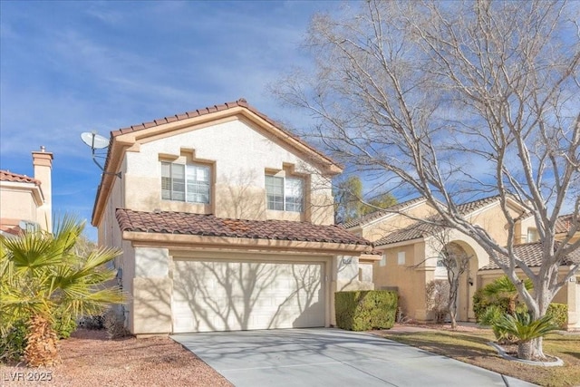 9836 La Vid Ct, Las Vegas, NV 89117 - mediterranean / spanish-style house with a tiled roof, concrete driveway, stucco siding, and an attached garage