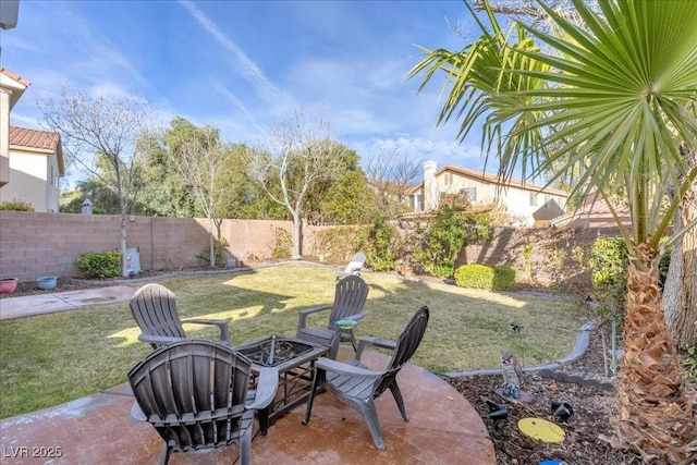 9836 La Vid Ct, Las Vegas, NV 89117 - fenced backyard with a fire pit