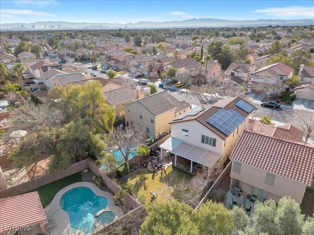9836 La Vid Ct, Las Vegas, NV 89117 - aerial perspective of suburban area with a pool area and mountains