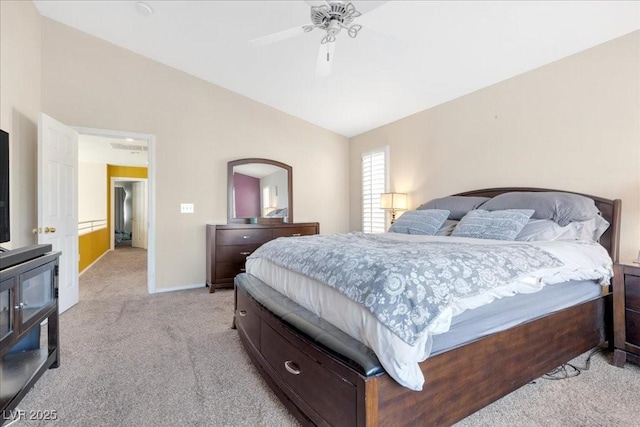 9836 La Vid Ct, Las Vegas, NV 89117 - bedroom with light colored carpet, vaulted ceiling, and a ceiling fan