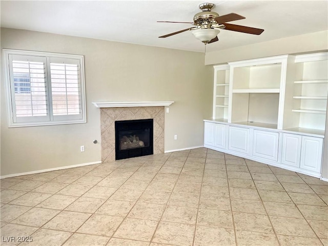 164 Swale Ln, Las Vegas, NV 89144 - unfurnished living room with a ceiling fan, a premium fireplace, and light tile patterned floors