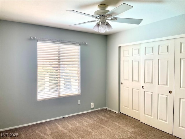 164 Swale Ln, Las Vegas, NV 89144 - unfurnished bedroom with carpet flooring, a closet, and a ceiling fan