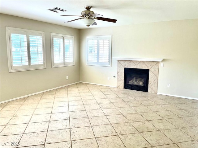 164 Swale Ln, Las Vegas, NV 89144 - unfurnished living room with a ceiling fan, light tile patterned floors, and a fireplace