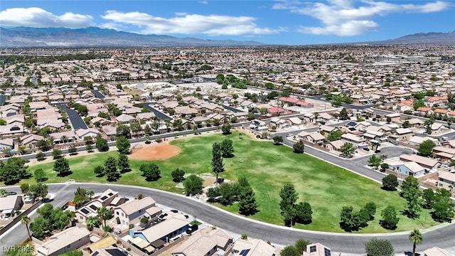 1205 Boulder Shore Ave, North Las Vegas, NV 89081 - aerial view of residential area with a mountainous background