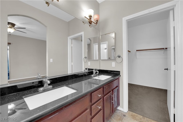 1205 Boulder Shore Ave, North Las Vegas, NV 89081 - bathroom with a ceiling fan and double vanity