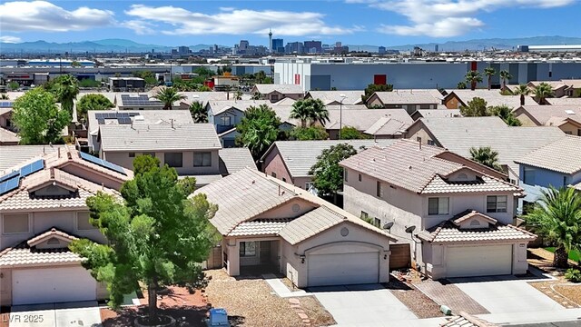1205 Boulder Shore Ave, North Las Vegas, NV 89081 - aerial view of residential area featuring a mountainous background