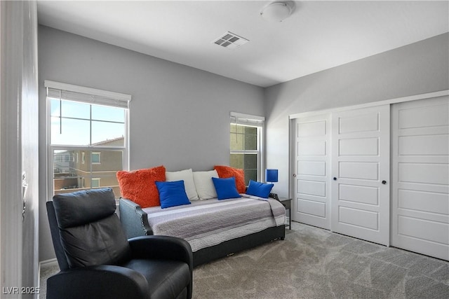 7009 Judith River St, North Las Vegas, NV 89084 - carpeted bedroom with multiple windows and a closet