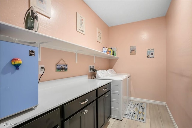 7009 Judith River St, North Las Vegas, NV 89084 - laundry area featuring cabinet space and independent washer and dryer