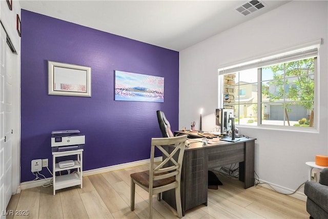 7009 Judith River St, North Las Vegas, NV 89084 - office space with wood finished floors and an accent wall