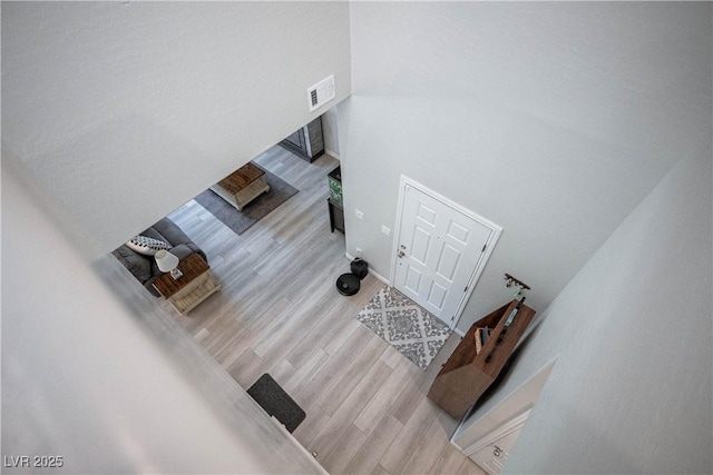 7009 Judith River St, North Las Vegas, NV 89084 - living area with wood finished floors and a towering ceiling