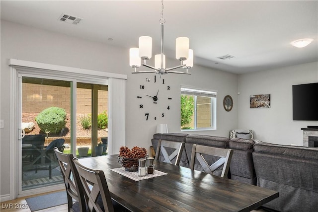 7009 Judith River St, North Las Vegas, NV 89084 - dining area featuring a chandelier