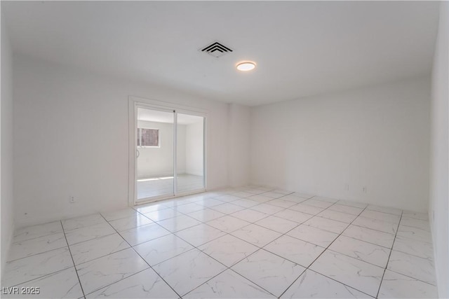 5317 Lytton Ave, Las Vegas, NV 89146 - empty room with light marble finish flooring