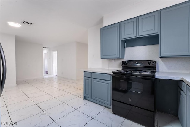 5317 Lytton Ave, Las Vegas, NV 89146 - kitchen featuring black / electric stove, light countertops, light marble finish floors, and blue cabinets