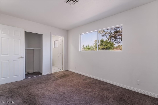 5317 Lytton Ave, Las Vegas, NV 89146 - unfurnished bedroom featuring carpet floors and baseboards