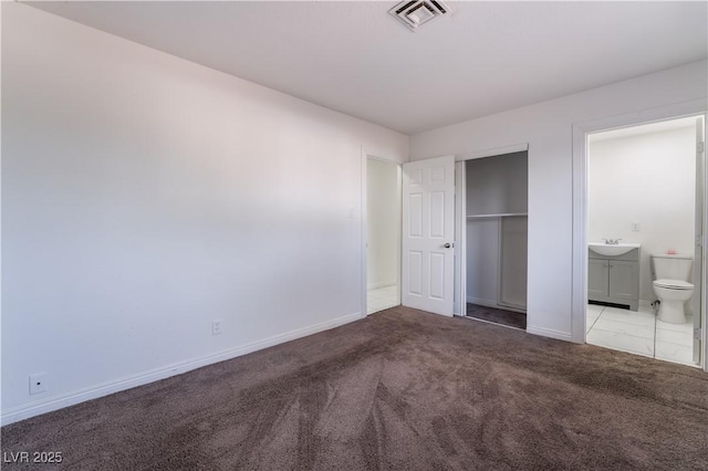 5317 Lytton Ave, Las Vegas, NV 89146 - unfurnished bedroom with carpet floors, ensuite bath, and a closet