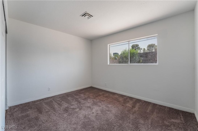 5317 Lytton Ave, Las Vegas, NV 89146 - spare room with carpet and baseboards